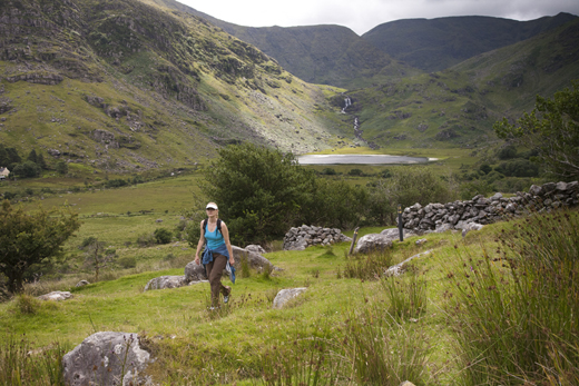 Hiker on the Kerry Way in McGillycuddy Reeks, Black Valley, County Kerry.