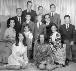 Young Stephen  (in jumper) with his  parents and ten older  siblings, 1968.