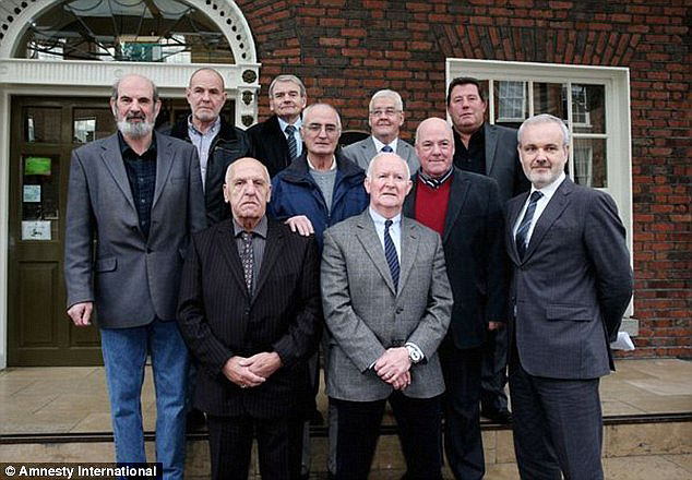 Victims: Colm O'Gorman, executive director of Amnesty International Ireland, (front right) with a number of the surviving victims. They became known as the 'Hooded Men' after revealing details of their treatment. (Photo: Daily Mail)