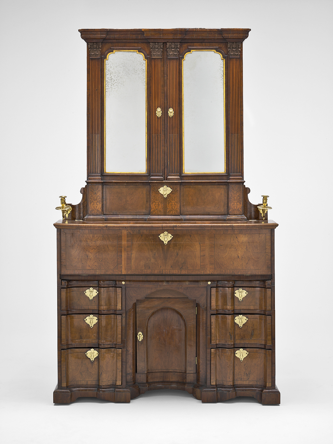 John Kirkhoffer Walnut  Secretary Cabinet, 1732. 18th-century Dublin was a booming city, attracting furniture makers and customers from England and the rest of Europe. The Kirkhoffer families were German Protestants who had fled to Ireland to escape religious persecution.  Jonathan Swift, author of Gulliver’s Travels, is said to have owned one of these cabinets. Art  Institute of Chicago. 