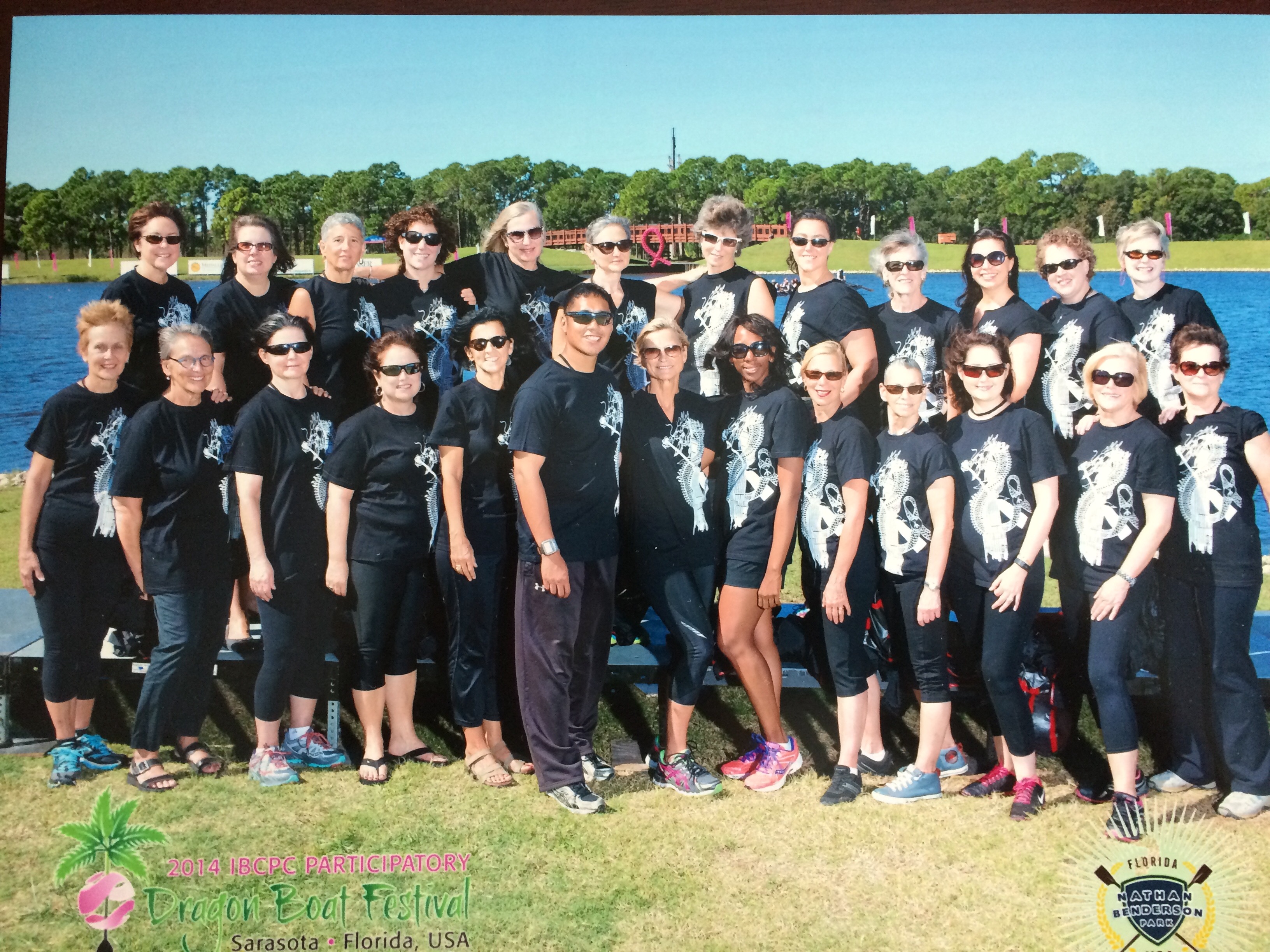 Members of the Empire Dragon Boat NYC team with their coaches, James Lozado (front row, left of center) and Akila Simon (front row, right of center) with captain Donna Wilson (front row center).