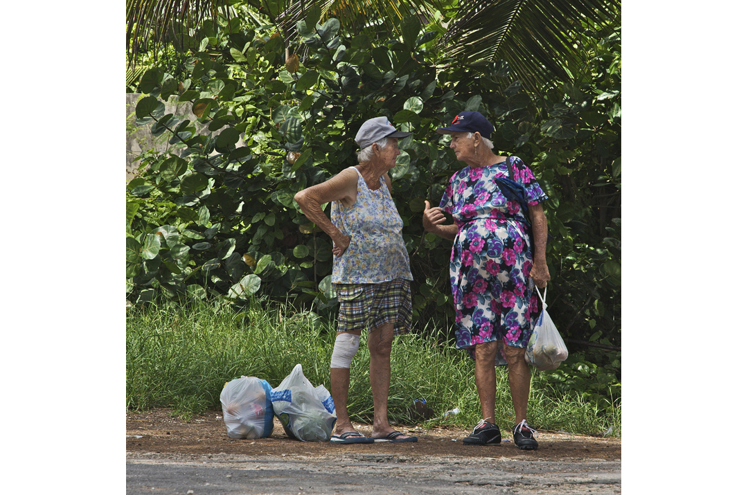 Village Gossip: Two of Erlene Downie's sisters stop for a chat.