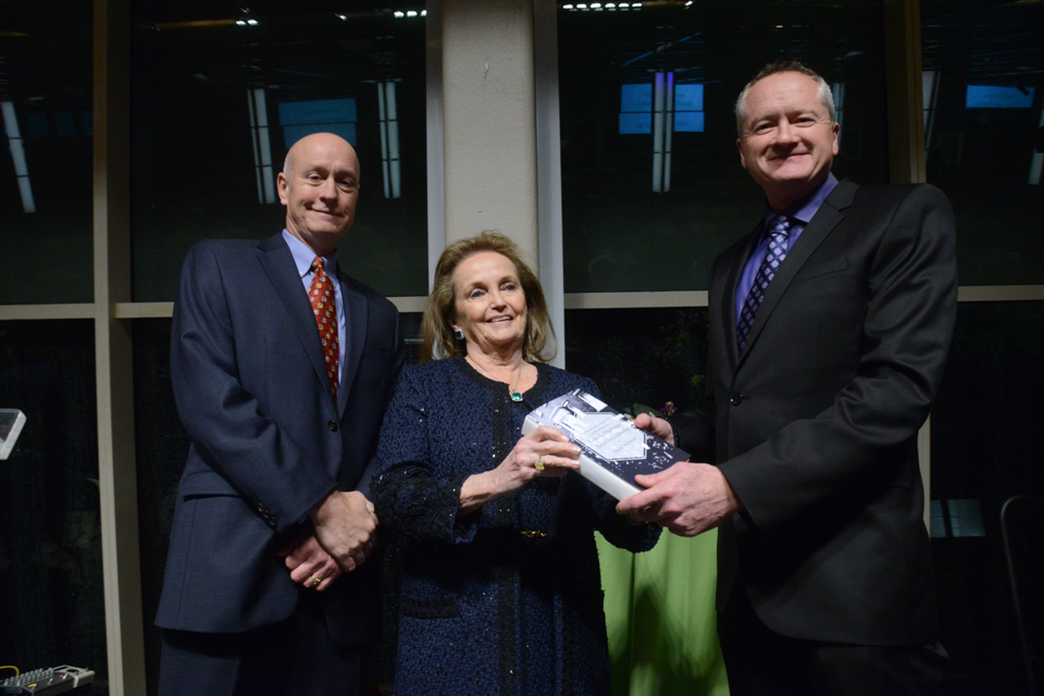 Dan Barry and Loretta Brenan Glucksman present Danny McDonald with the Lewis Glucksman Award for Leadership. (Photo by James Higgins)