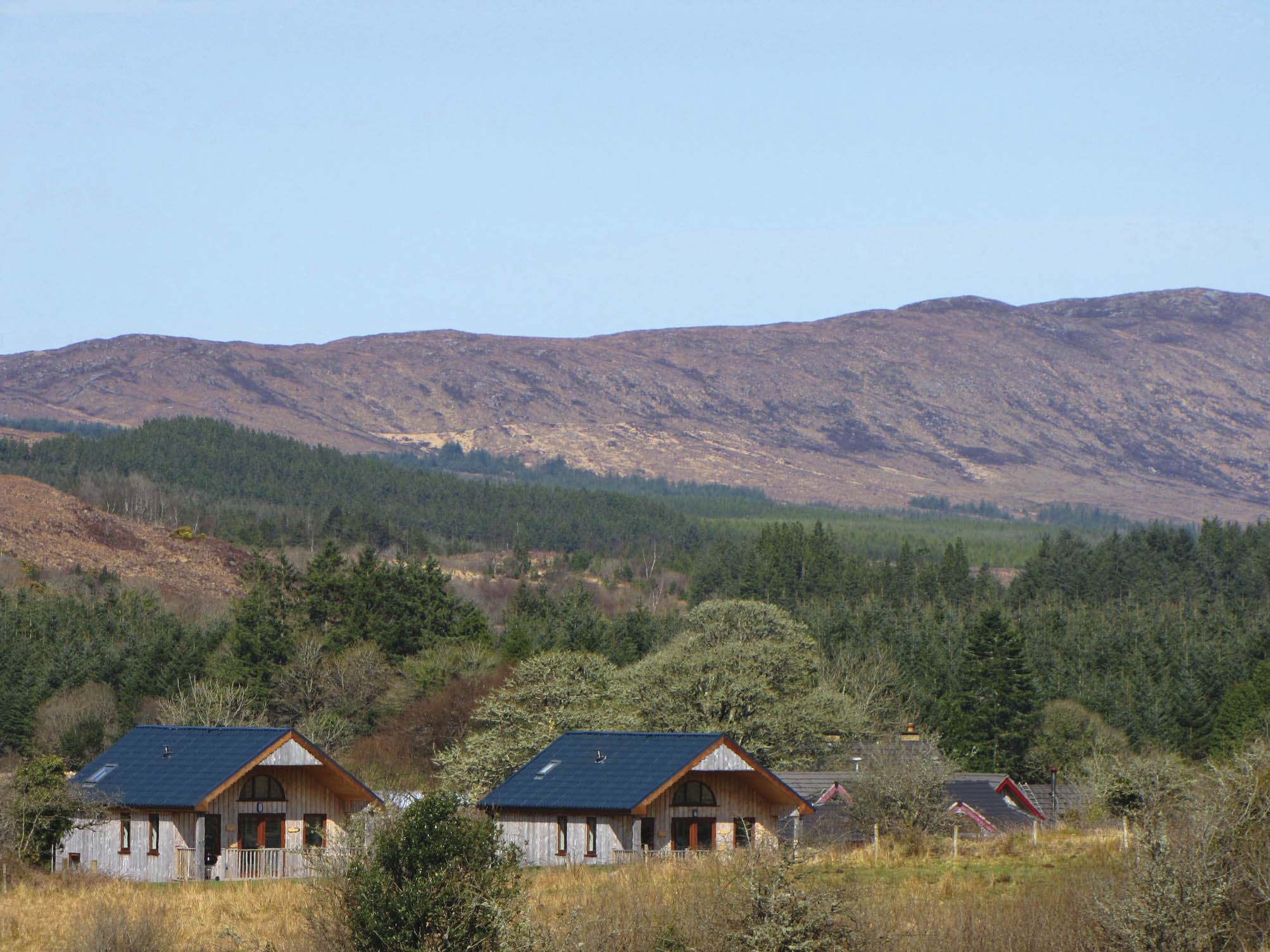 The cabins at Ard Nahoo, Co. Leitrim, where the importance of simple pleasures is emphasized.