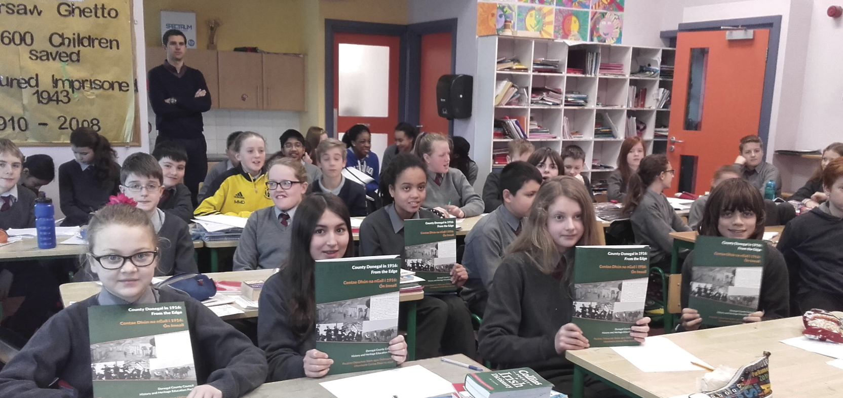 Children from  Illistrin National School receive copies of County Donegal in 1916: From the Edge, History and Heritage Education Pack, February 2016. (Photo: Eileen Burgess)