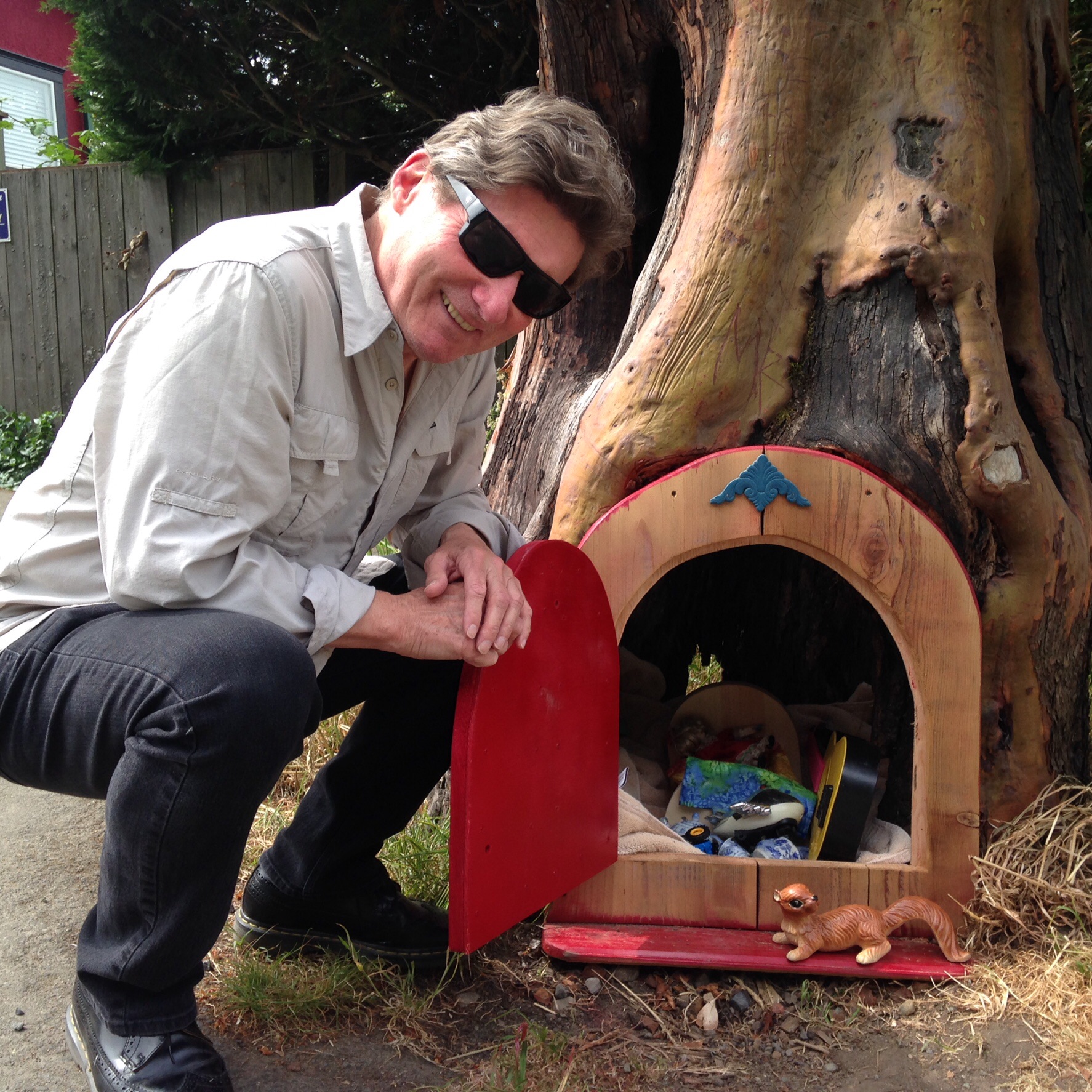 Roger Brunt with an example of one of the fairy doors on Salt Spring Island. 