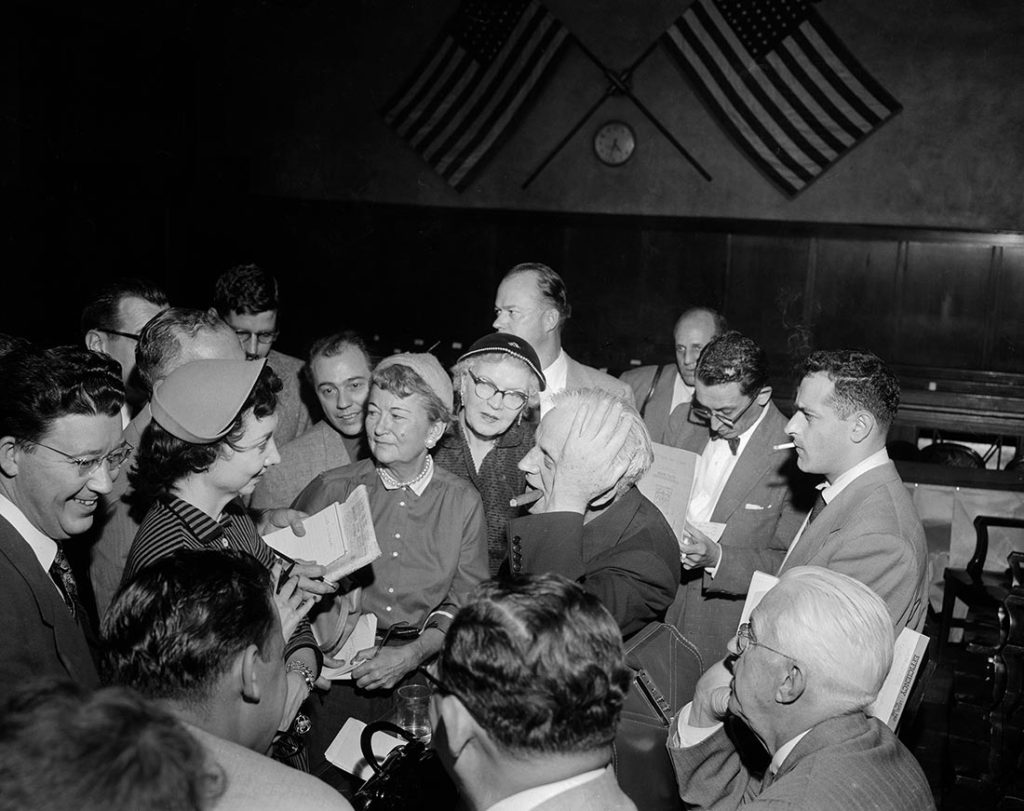 Dorothy flanked by fans during the trial of Sam  Sheppard.