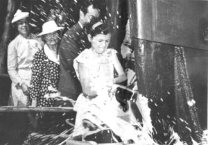 Nancy Moran, daughter of Edmond J. Moran, christens the Liberty Ship Michael Moran, named in honor of her great-grandfather in 1944.