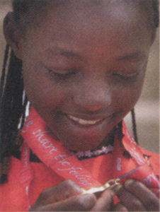 Liinah Bukeya, age 12 from Uganda, winner of the gold medal in the 50 metre backstroke.