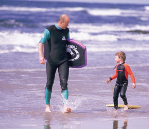 Enjoying the surf on the beach at Bundoran. Courtesy of Tourism Ireland.