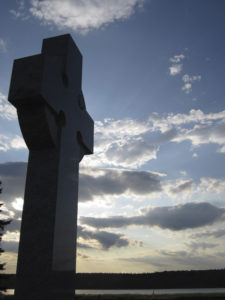 The Middle Island memorial cross at sunset. Photo: John Kernaghan.