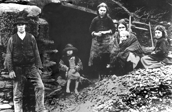 Eviction scene: The descendants of the family in this photograph, taken in Glenbeigh, Co. Kerry in 1888, may have survived the Great Famine, but one wonders what became of them following their eviction and demolition of their home. From the Sean Sexton Collection.