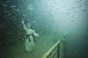 The resting ships at the bottom of the sea offer a unique background for the photographs of Andreas Franke. The photographer says: “With my photographs of sunken shipwrecks, I want to pull the spectators into unreal and strange worlds. Mystified scenes of the past play within a fictional space. Dreamworlds you can get lost in or that you can identify with. This creates a new and unexpected atmosphere. This work shows [a lot] of myself, since I am always on the lookout for stunning themes to create new images never seen before.” Photo: Andreas Franke.