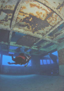 A diver explores the super-structure of the USS Hoyt S. Vandenberg. Photo: Don Kincaid