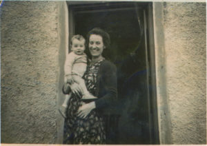 With his mother, Meg, in front of their thatched cottage home in Knockaderry, Limerick.