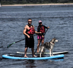 Lyndon Villone, with his dog Ice, paddle boarding in Jamaica Bay. Photo: Legends of Valor.