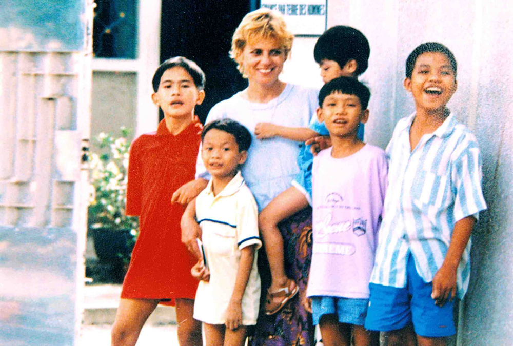 Christina Noble in Vietnam with some of the children in her care in an undated photograph. 