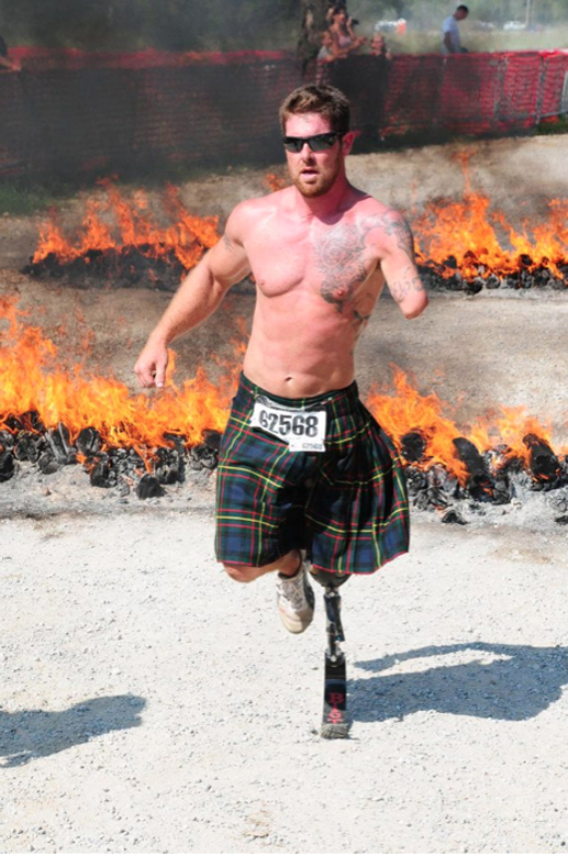 Noah Galloway taking part in an extreme race called Tough  Mudders, in  which ultimate  fitness athletes compete over tough obstacles that include fire, mud and water. (Photo courtesy Noah Galloway)