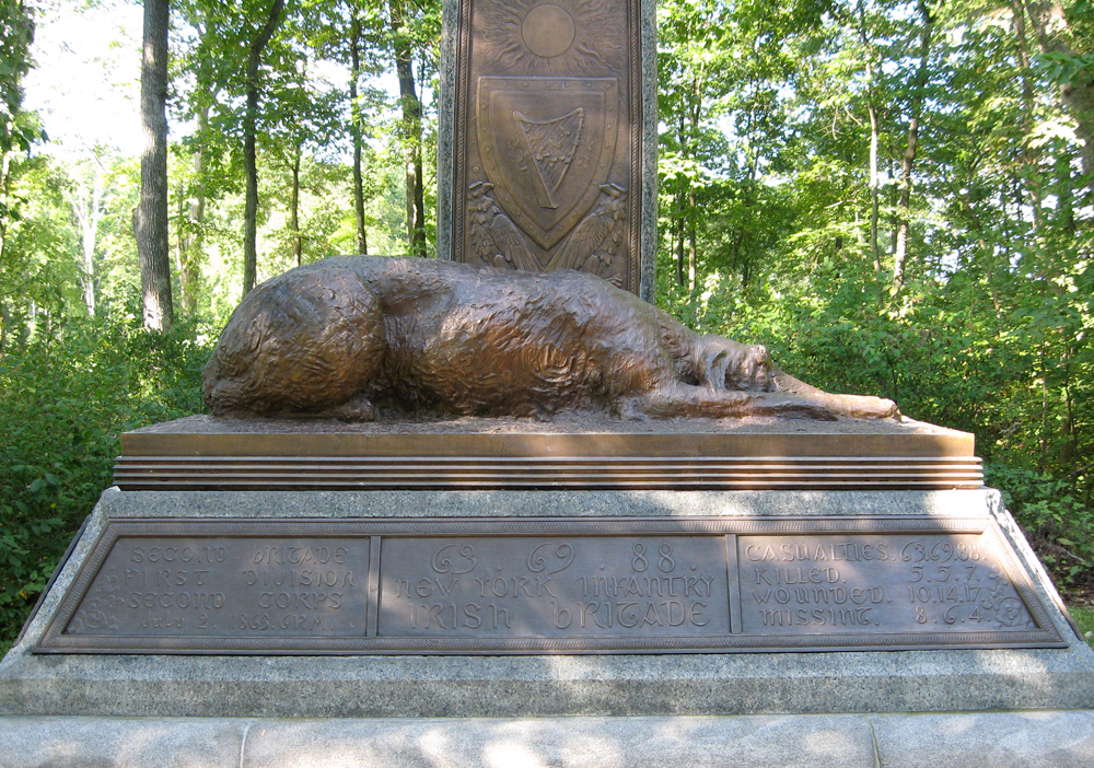 The Irish Brigade monument, where anwolfhound sleeps at the foot of a Celtic Cross. (Photo: gettysburg.stonesentinels.com)