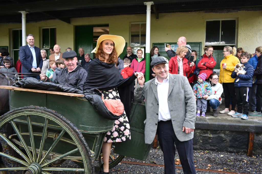 Mary Kate Danagher (Eva Eagleton) and Seán Thornton (Ros na Rún star Denis O'Connor) arrive at Castletown station for the launch of the crowd funding campaign. (Photo: Ballyglunin Railway Restoration Project / Facebook)
