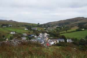 View from the monastic site at the old church down to the village, looking east. The main road is seen as it leaves Kilcar in direction to Killybegs.