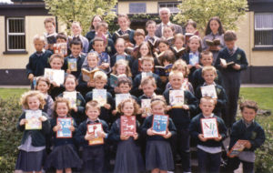 Students from Scoil Naomh Gobnait, Dungarvan, Waterford, show off their new books purchased with the Partnership grant.