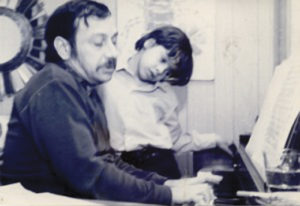 With his father, Chico, when Arturo was 6.