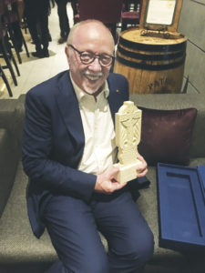 The Armenian National Committee of America named Terry Man of the Year in 2018. The cross (a typical Armenian cross) is the national symbol.