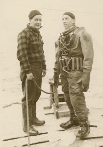 Patrick Killen tending to another diver, Jim McCamber, 1957.