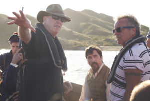 On the set of The Promise with the film's star, Christian Bale (center).