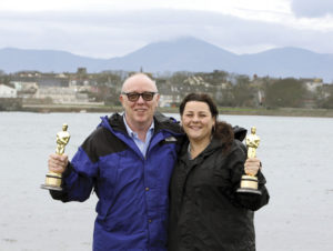 Ulster homecoming: Terry and his daughter Oorlagh pose with their joint Oscars for The Shore. The film won the 2012 Oscar for Best Live Action Short Film.