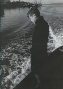 This photograph of JFK, taken in Coos Bay, Oregon, shortly after he addressed a group of tough, hostile longshoremen in their union hall, shows a pensive Kennedy, obviously preoccupied with his failure to reach the men. Photograph by Jacques Lowe.