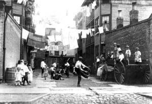 Backyard playground used by Irish immigrant children, Boston, 1912.