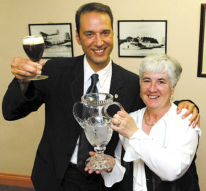 Festival Director, Margaret O'Shaughnessy, bestows Siletti with the Irish Coffee Champion honor.