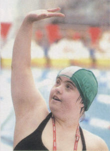 Irish athlete Brid Lynch celebrates winning a silver medal in the 400 meter freestyle Division 3 final.