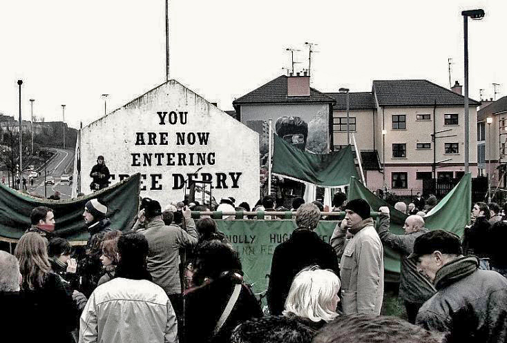 The 35th anniversary commemoration of Bloody Sunday in Derry, Ireland (January 2007).  At the end of the march, people gathered at Free Derry Corner, where the names of the victims were read. Photo: Wikipedia