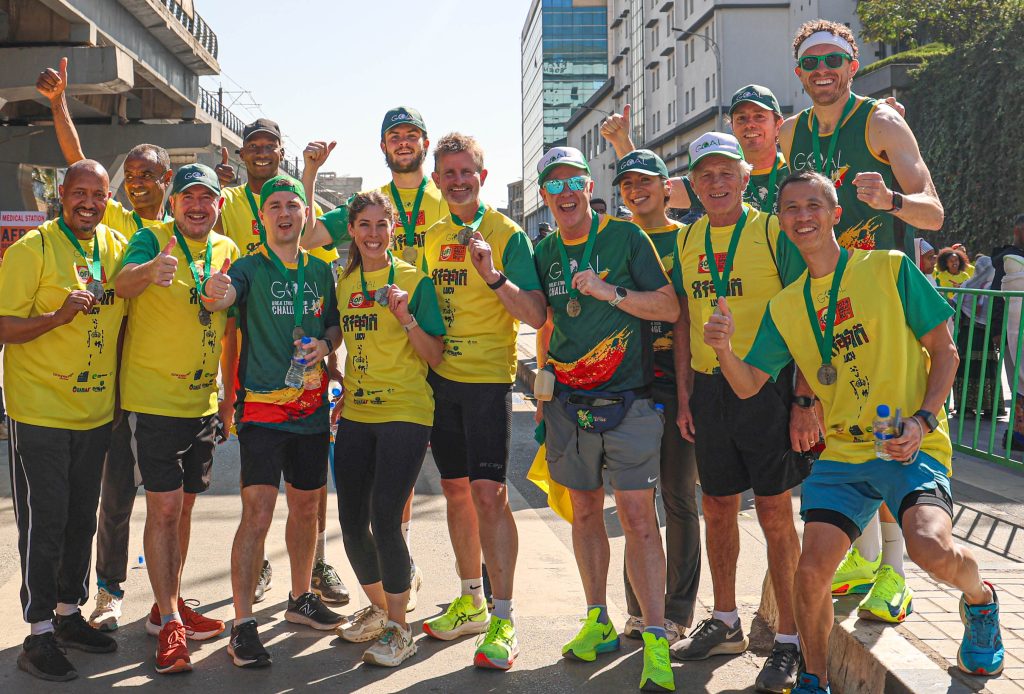 The GOAL USA Great Ethiopian Run team celebrates after finishing the 10km course in Addis Ababa, Ethiopia.