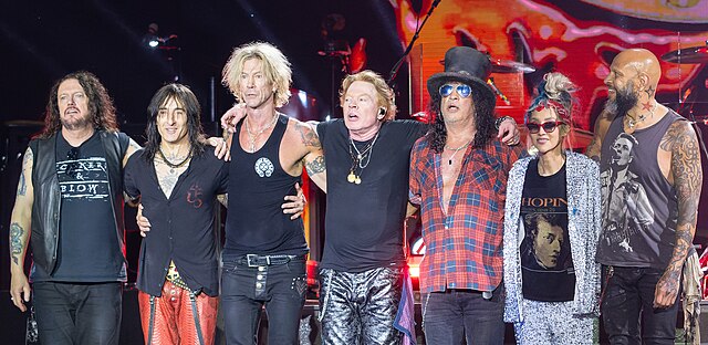 Guns N' Roses at Glastonbury Festival 2023. From left to right: Dizzy Reed, Richard Fortus, Duff McKagan, Axl Rose, Slash, Melissa Reese and Frank Ferrer. Photo: Wikipedia