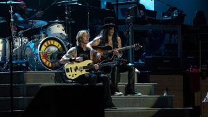 Duff and Slash playing together in 2018. Photo: Wikipedia